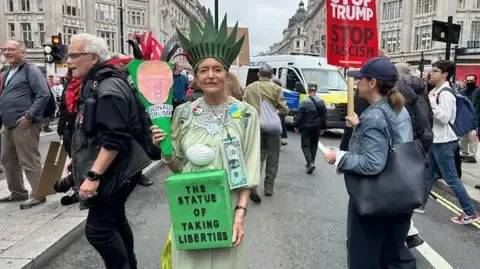 Numerous Protesters Converge in Central London to Challenge President Trump's Return Diplomatic Journey